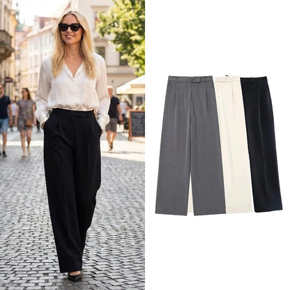 Calças femininas vintage de cintura alta com fecho frontal, corte reto e estilo chic.