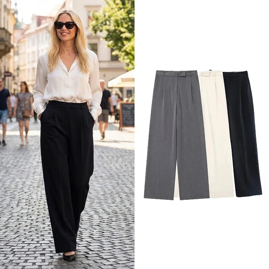 Calças femininas vintage de cintura alta com fecho frontal, corte reto e estilo chic.