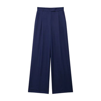 Calças femininas vintage de cintura alta com fecho frontal, corte reto e estilo chic.